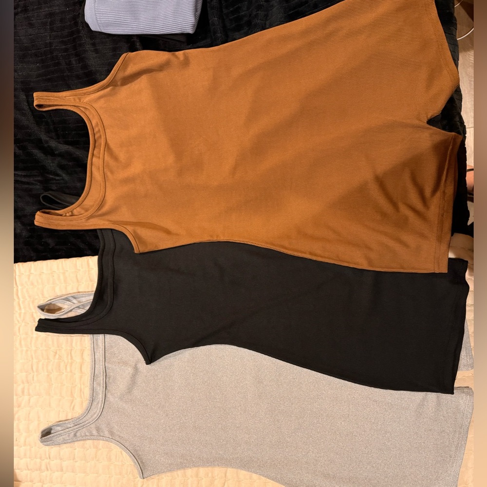 3 body suits! Never worn!